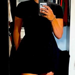 Black mini dress with pockets